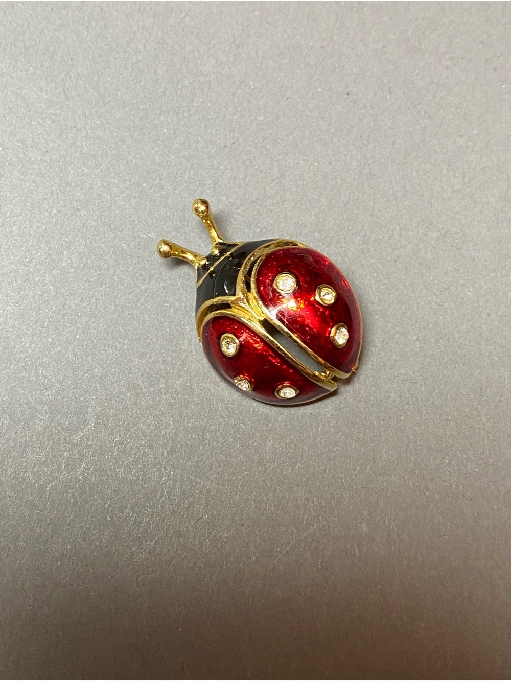 Vintage enamel rhinestone ladybug pin